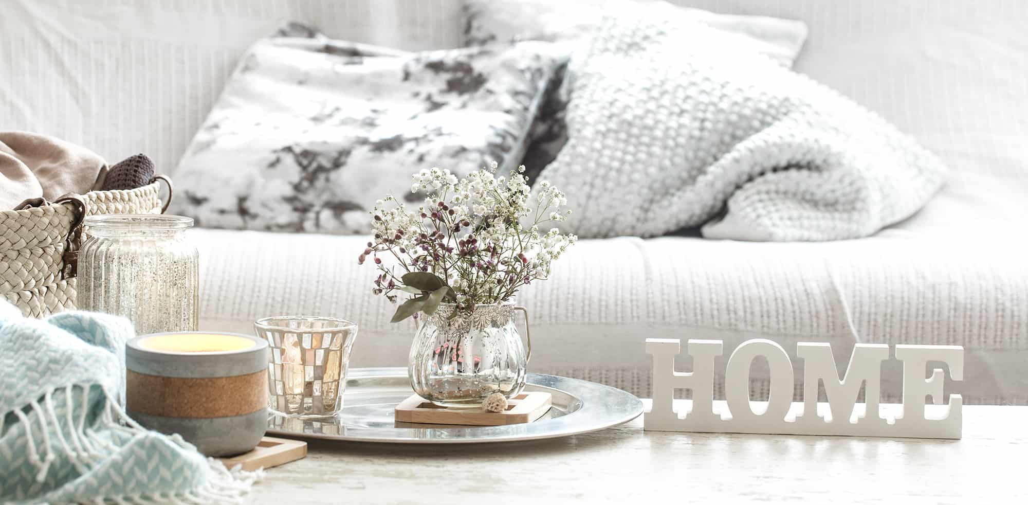 Couch and coffee table with flowers