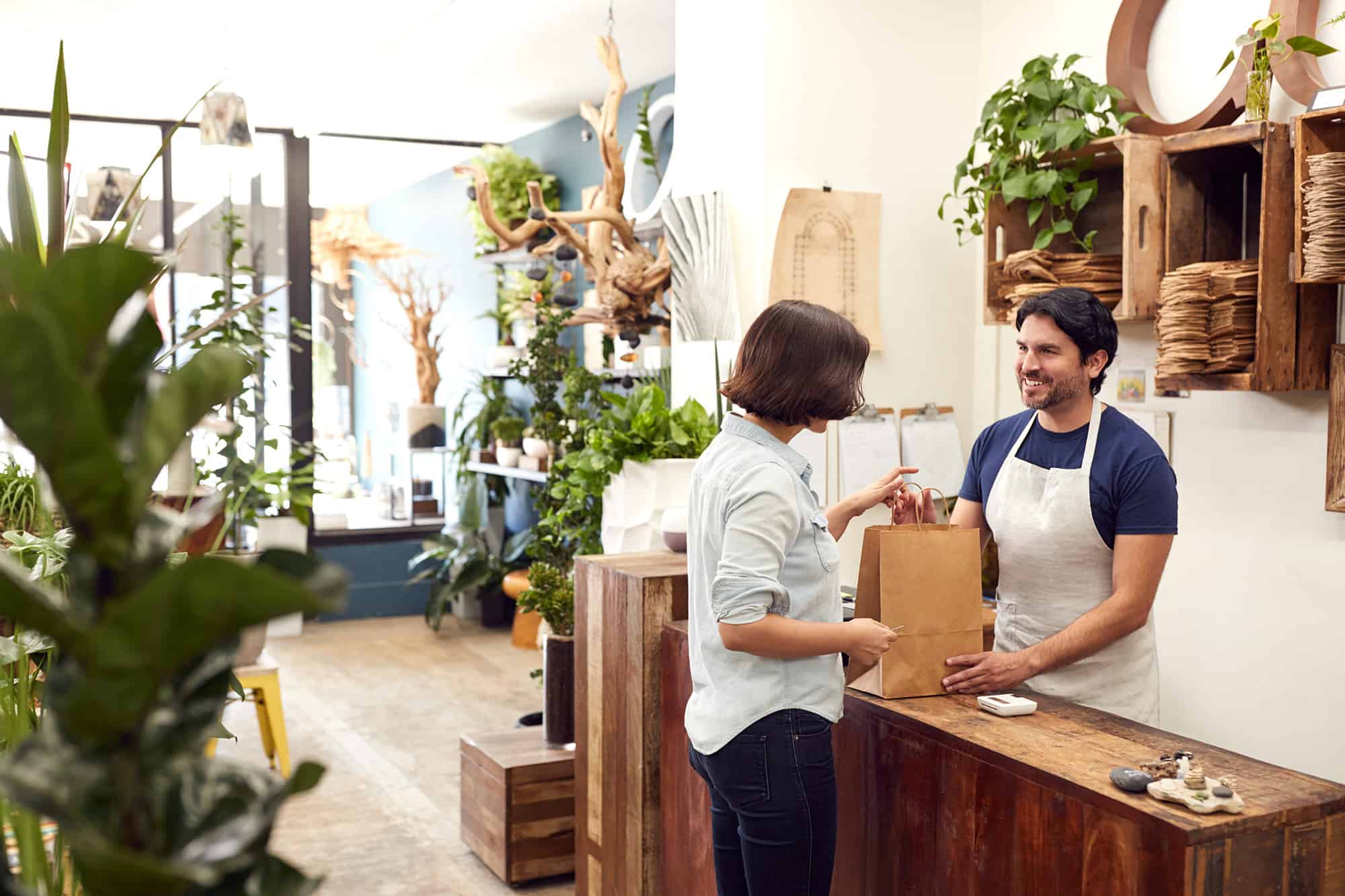 Woman and cashier at store