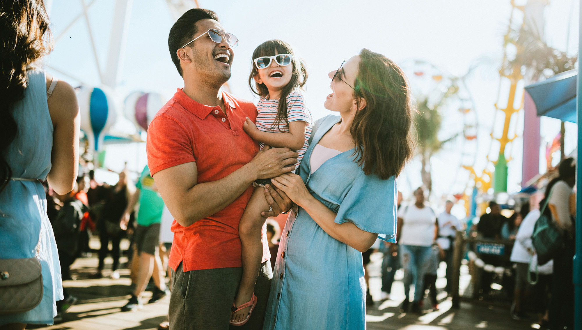 Young family at amusement park