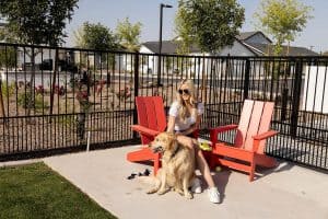Woman with dog at Cyrene at Meadowlands in Lincoln, California